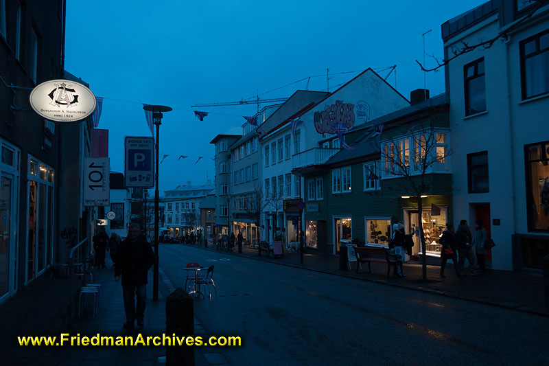 street,dusk,dawn,night,evening,blue,sky,city,town,center,shops,stores,incandescent,